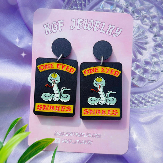 One Eyed Snakes Acrylic Earrings, Keychains & Pins