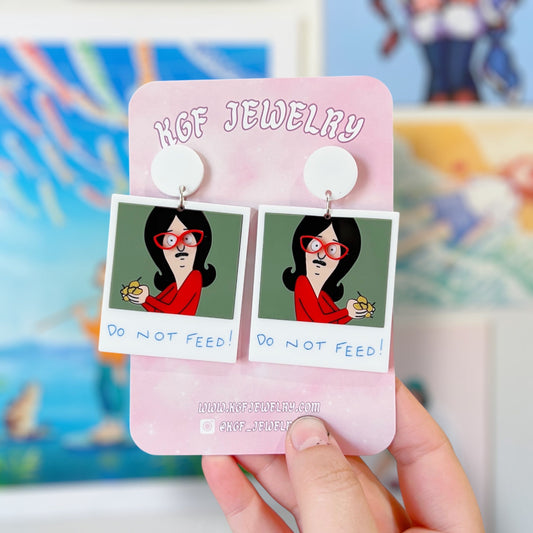 Do Not Feed Linda Acrylic Earrings & Keychains